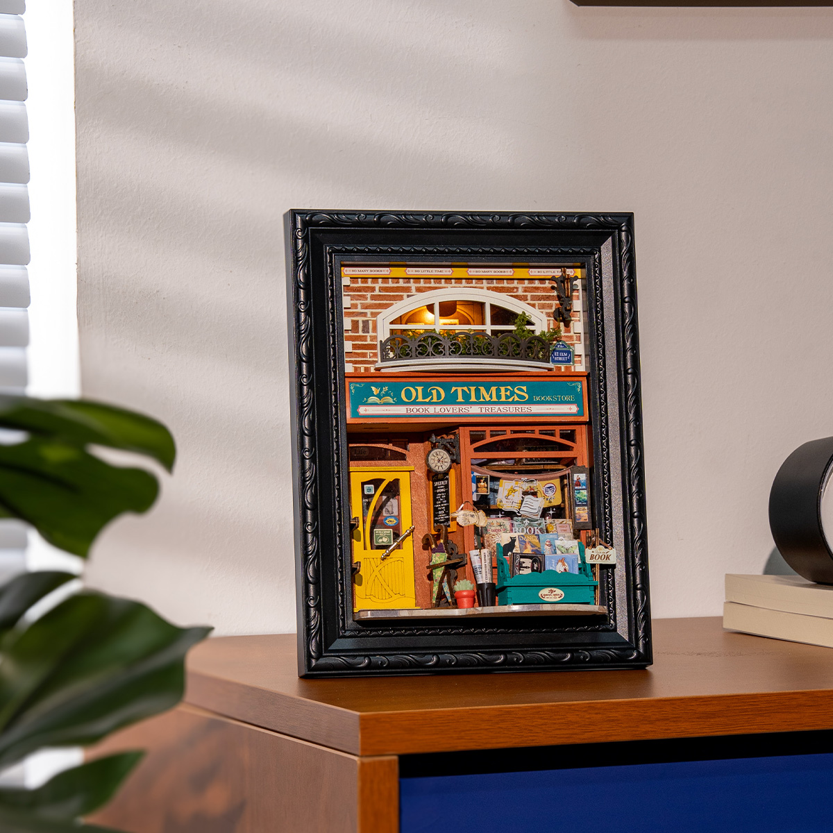 Rolife Old Times Bookstore DP004 story frame displayed on a tabletop