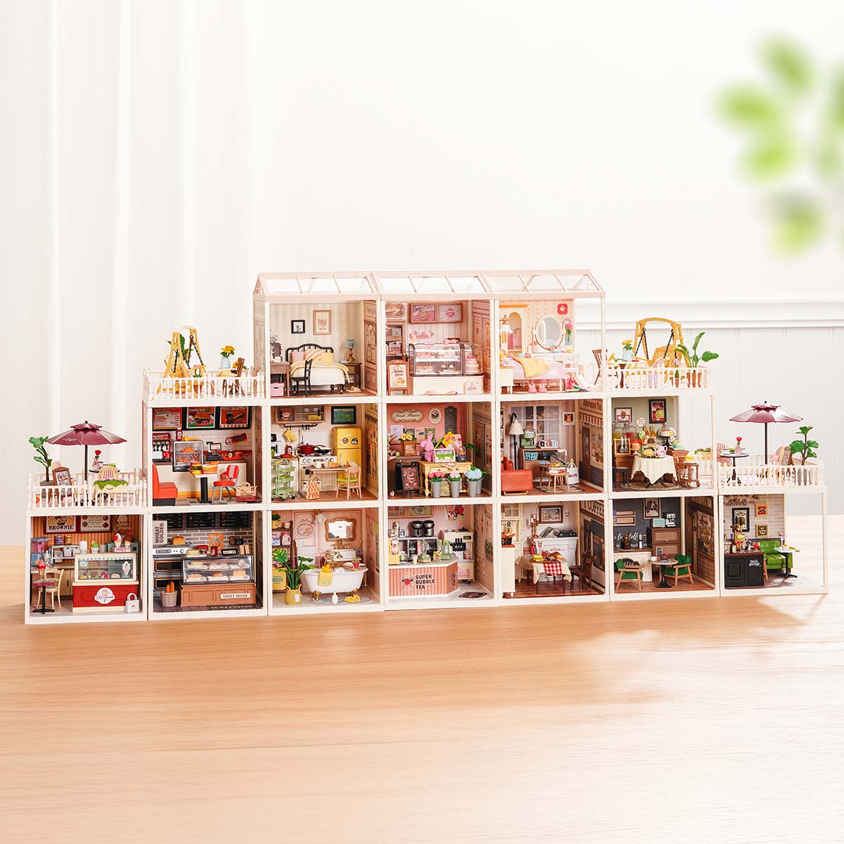 Rolife Super Creator Series 15 in 1 full miniature house combination display on a tabletop