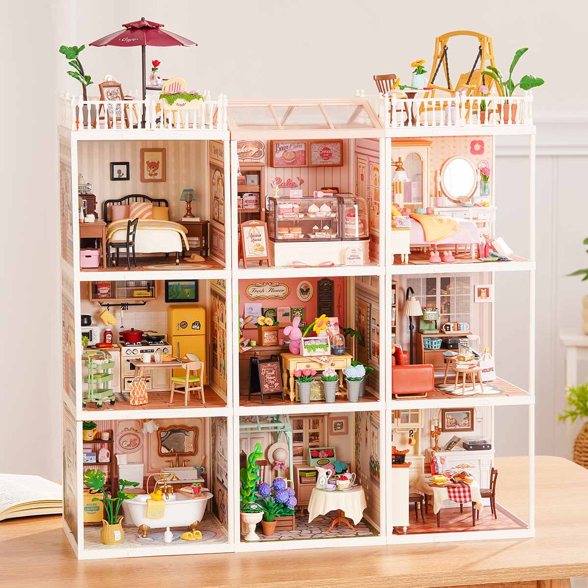 Rolife Super Creator 9 in 1 nine-grid miniature house combination display on a tabletop