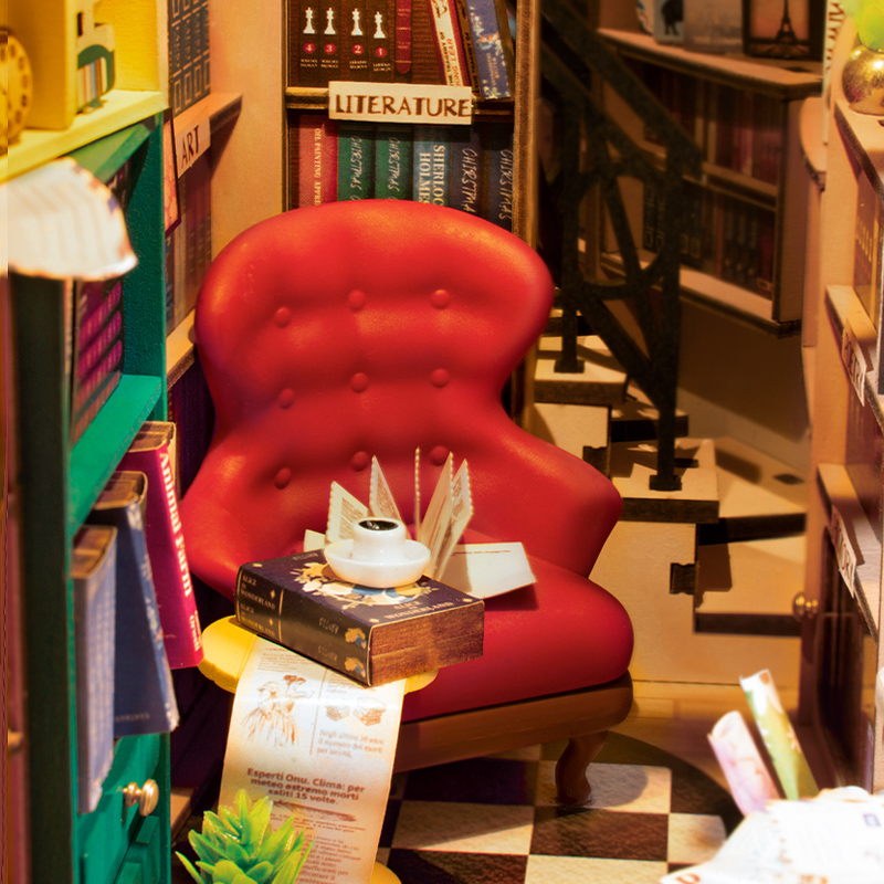 Rolife DIY Book Nook Kit - Bookstore TGB07 reading chair and bookshelf detail close-up