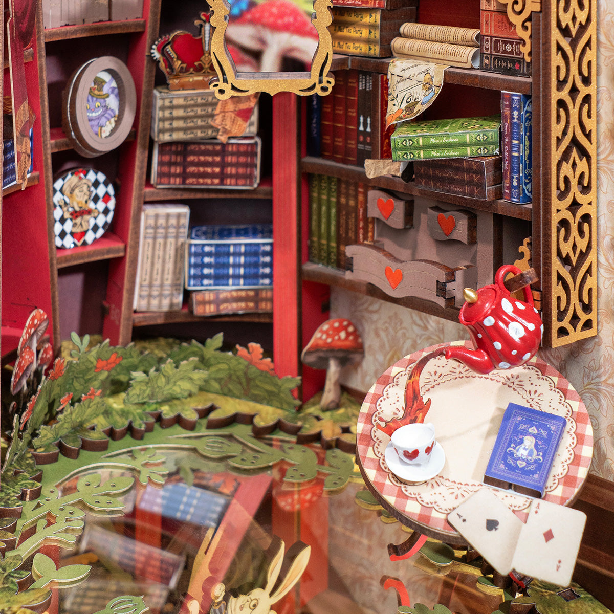 Close-up of Fall into Wonder TGB12 interior with books, tea set, and Wonderland props