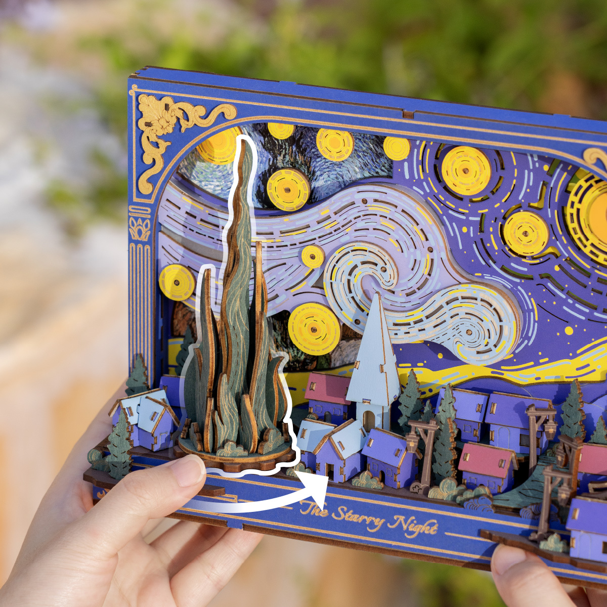 The Starry Night wooden art puzzle held during tabletop display