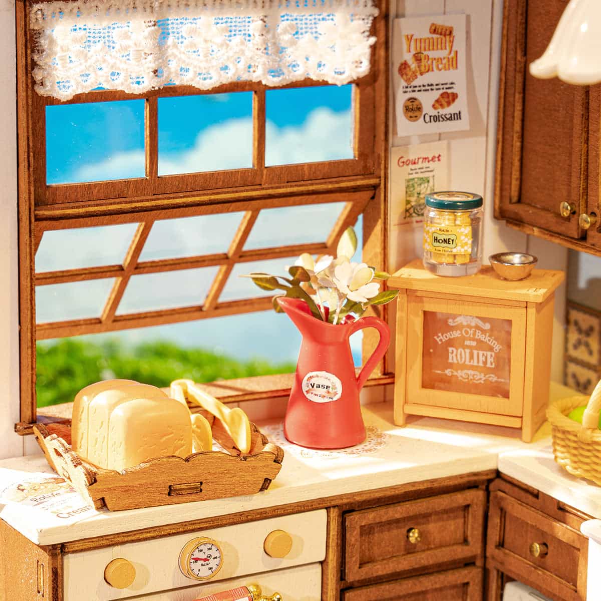 Baking Kitchen DG172 window-side baking area with bread, flowers, and cabinet details
