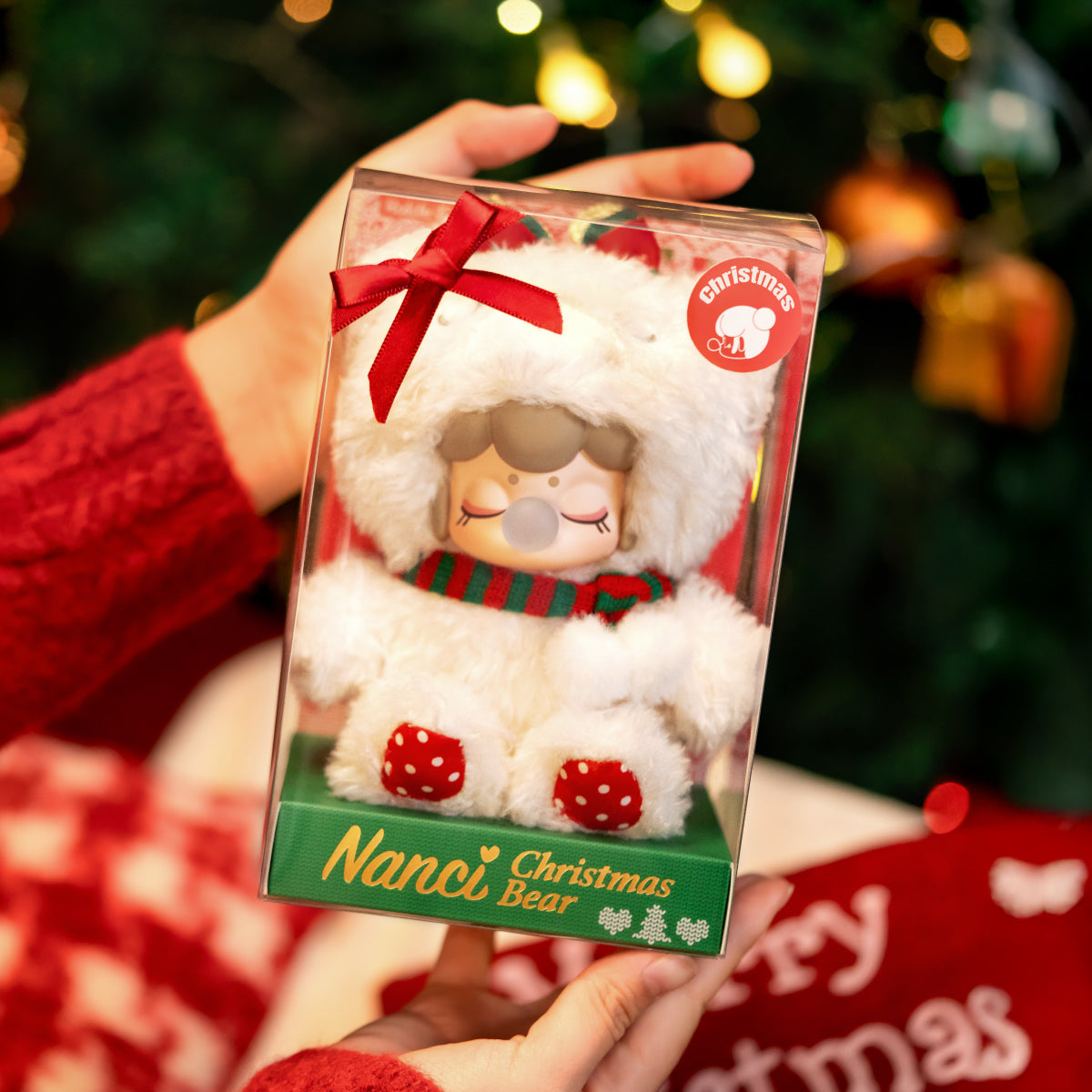 Nanci Christmas Bear plush pendant product package held in hand