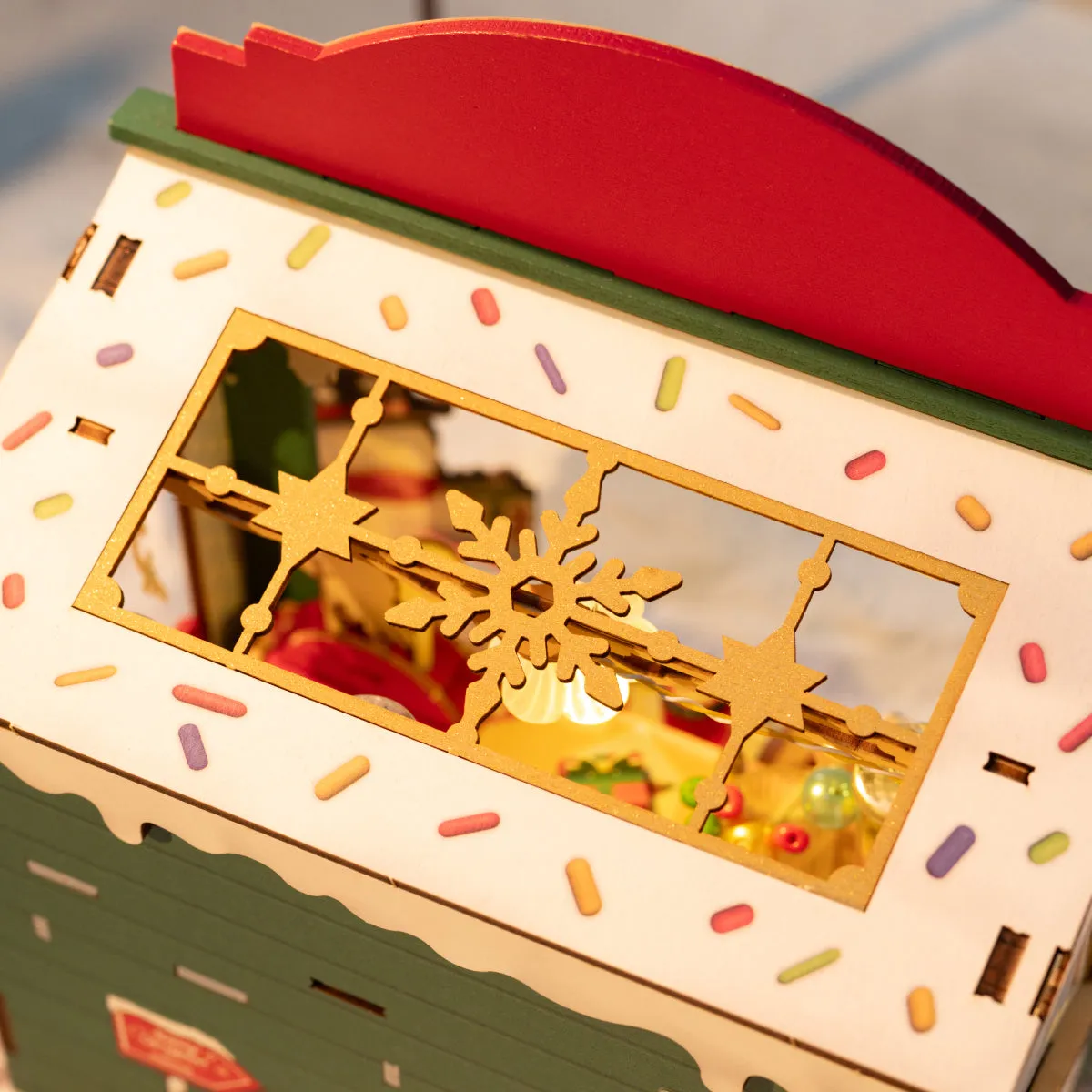 Christmas Candy Stand DS043 close-up of roof window snowflake and holiday light details
