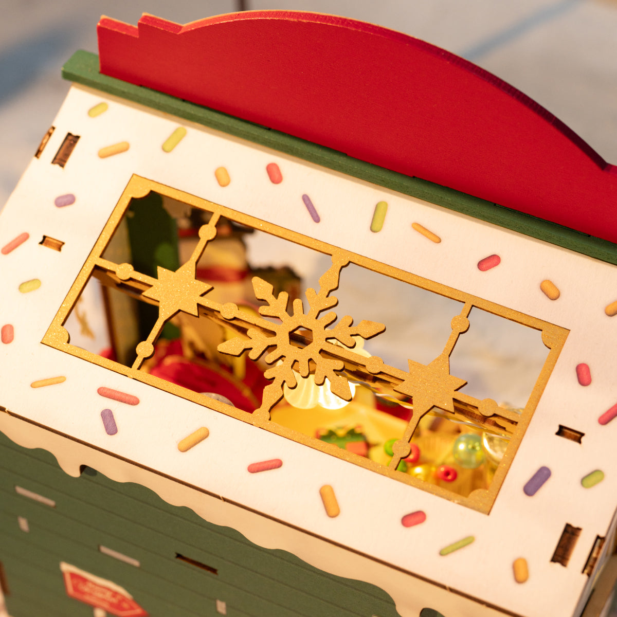 Christmas Candy Stand DS043 close-up of roof window snowflake and holiday light details