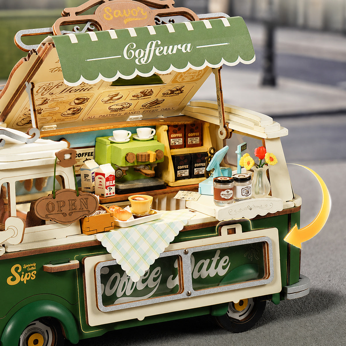 Close-up of Leo's Coffee Truck TGS07 counter with coffee cups, menu, and flowers