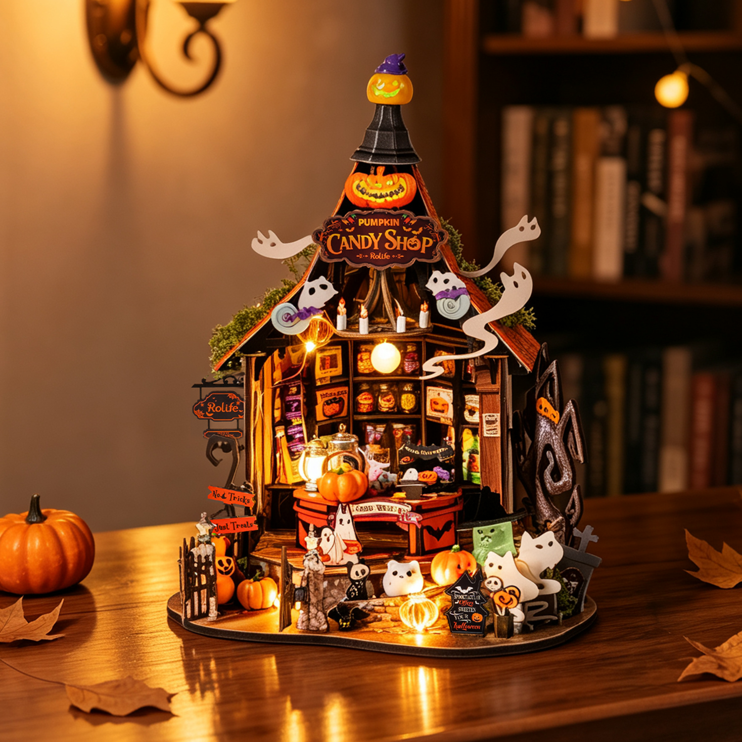 Rolife Haunted Candy House illuminated Halloween candy shop scene on a table