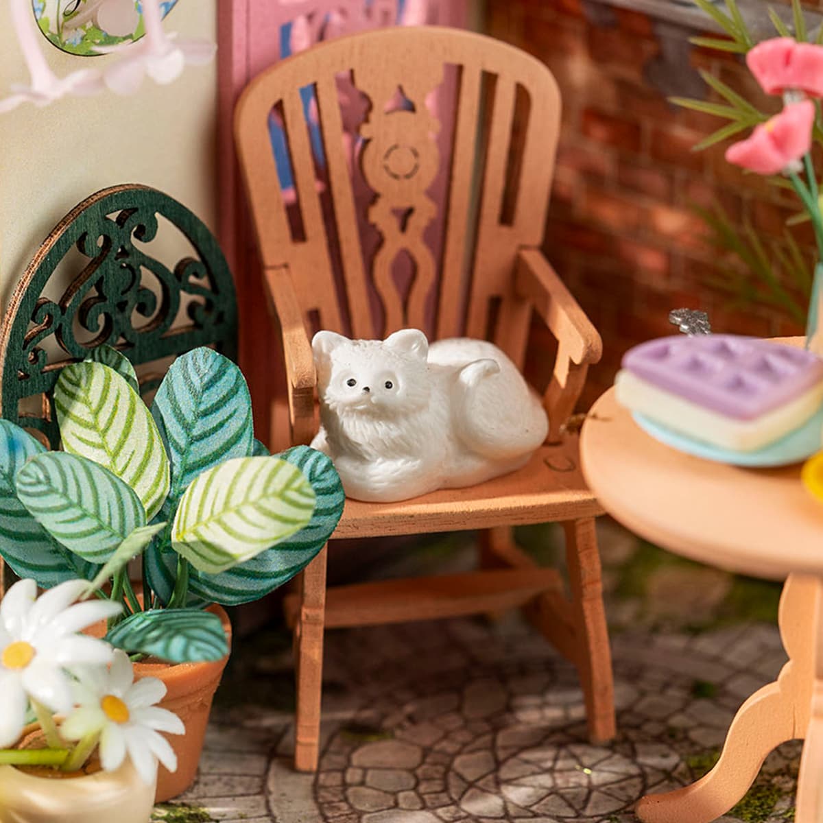 Rolife DIY Miniature House - Fancy Tea Yard DS038 chair and cat detail close-up
