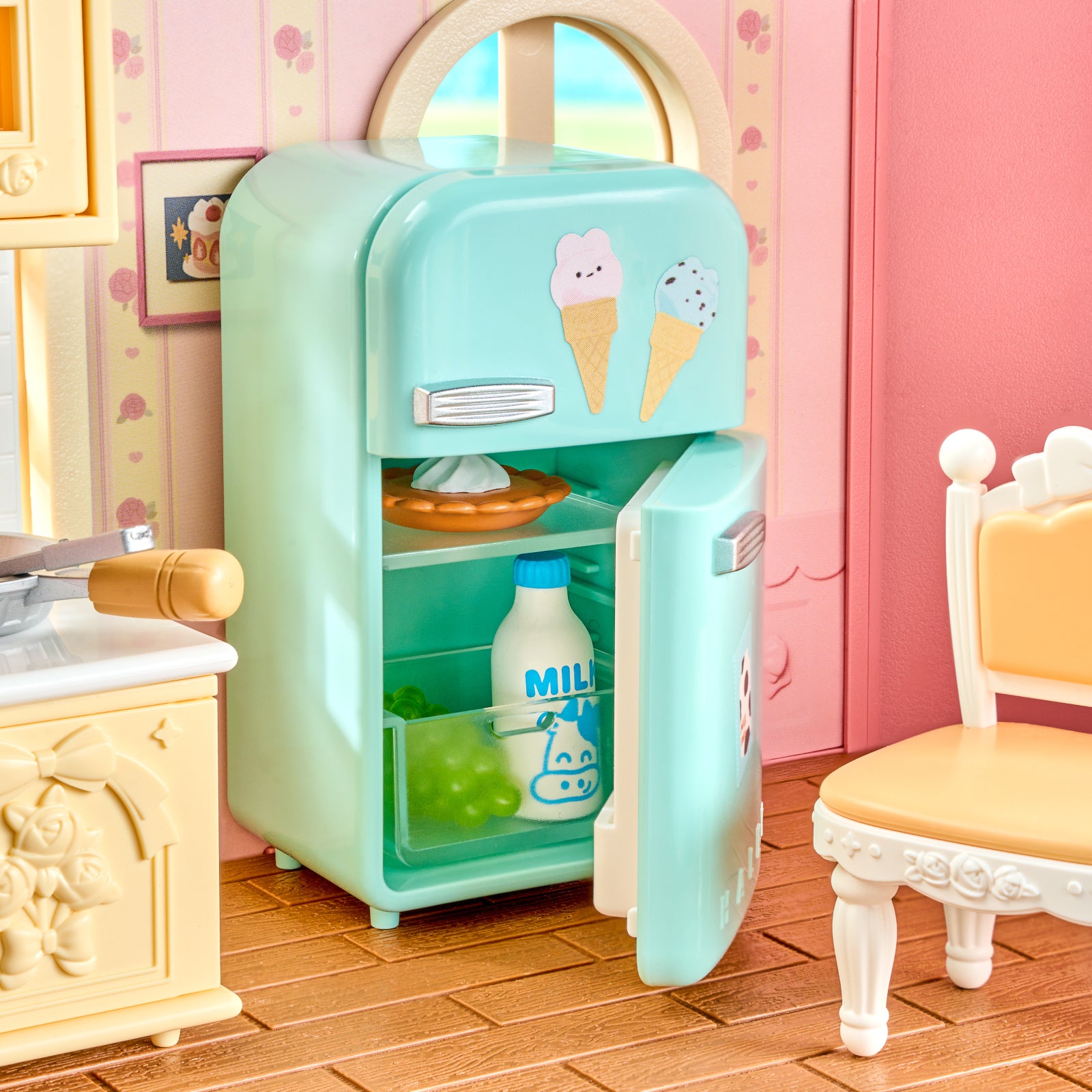 Rolife Fairy Rose Cottage HH001 refrigerator and dining corner with pastel furniture.