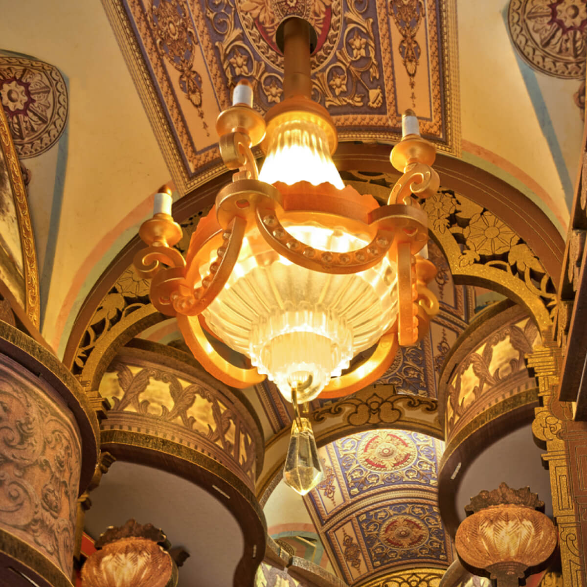 Library of Wonders TGB16 close-up of the chandelier and balcony details