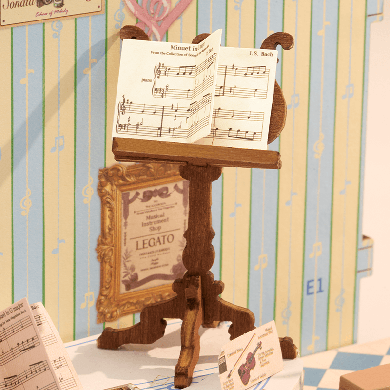 Melody Instrument Shop DS047 close-up of violin, music stand, and sheet music details