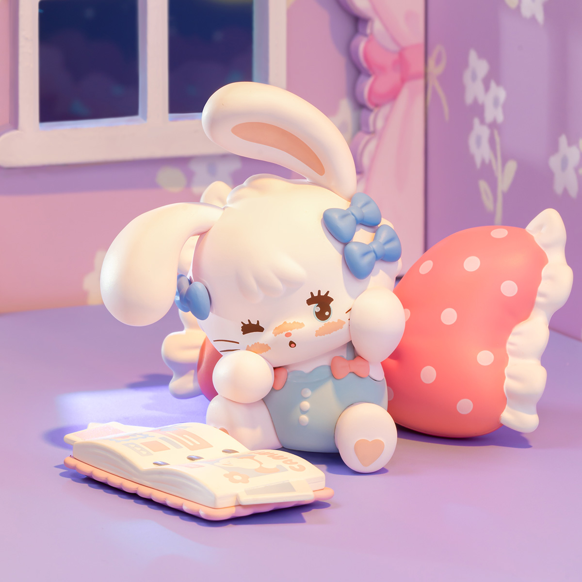 Mikko Babies Little World Bedtime Reading secret edition figure on a soft pink chair
