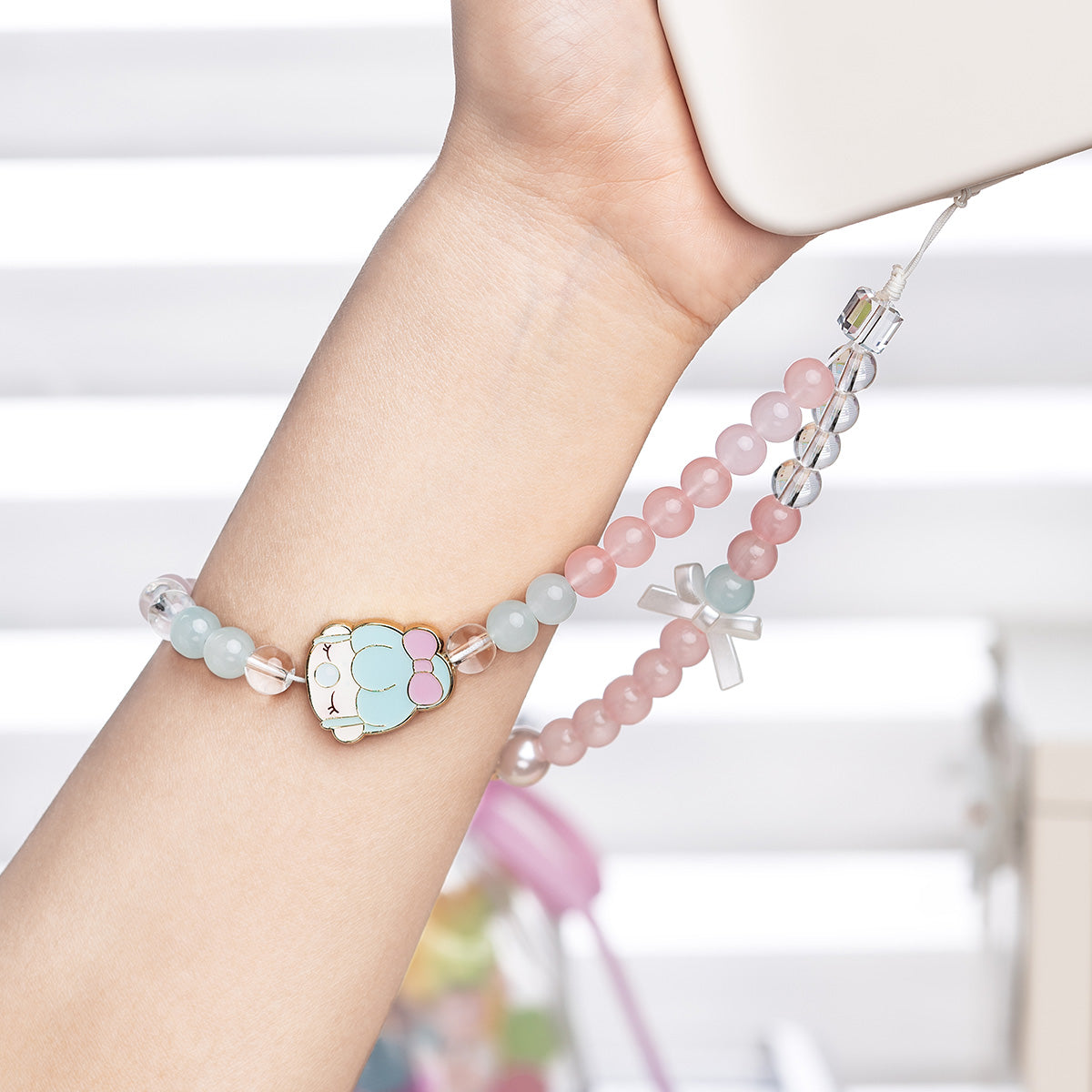Nanci Sweet Time phone lanyard worn as a beaded wrist strap