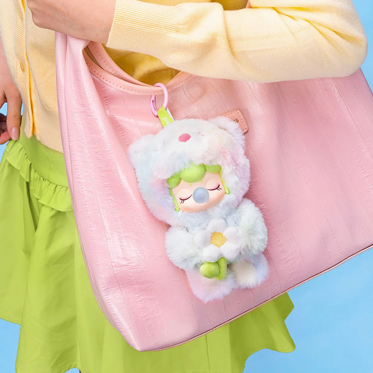 Rolife Nanci Spring Bear MN003 plush pendant attached to a pink bag.