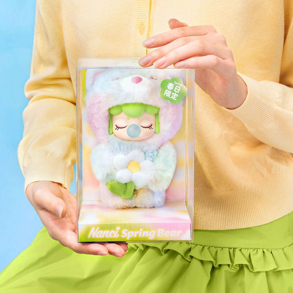 Rolife Nanci Spring Bear MN003 plush pendant packaging held in hand.