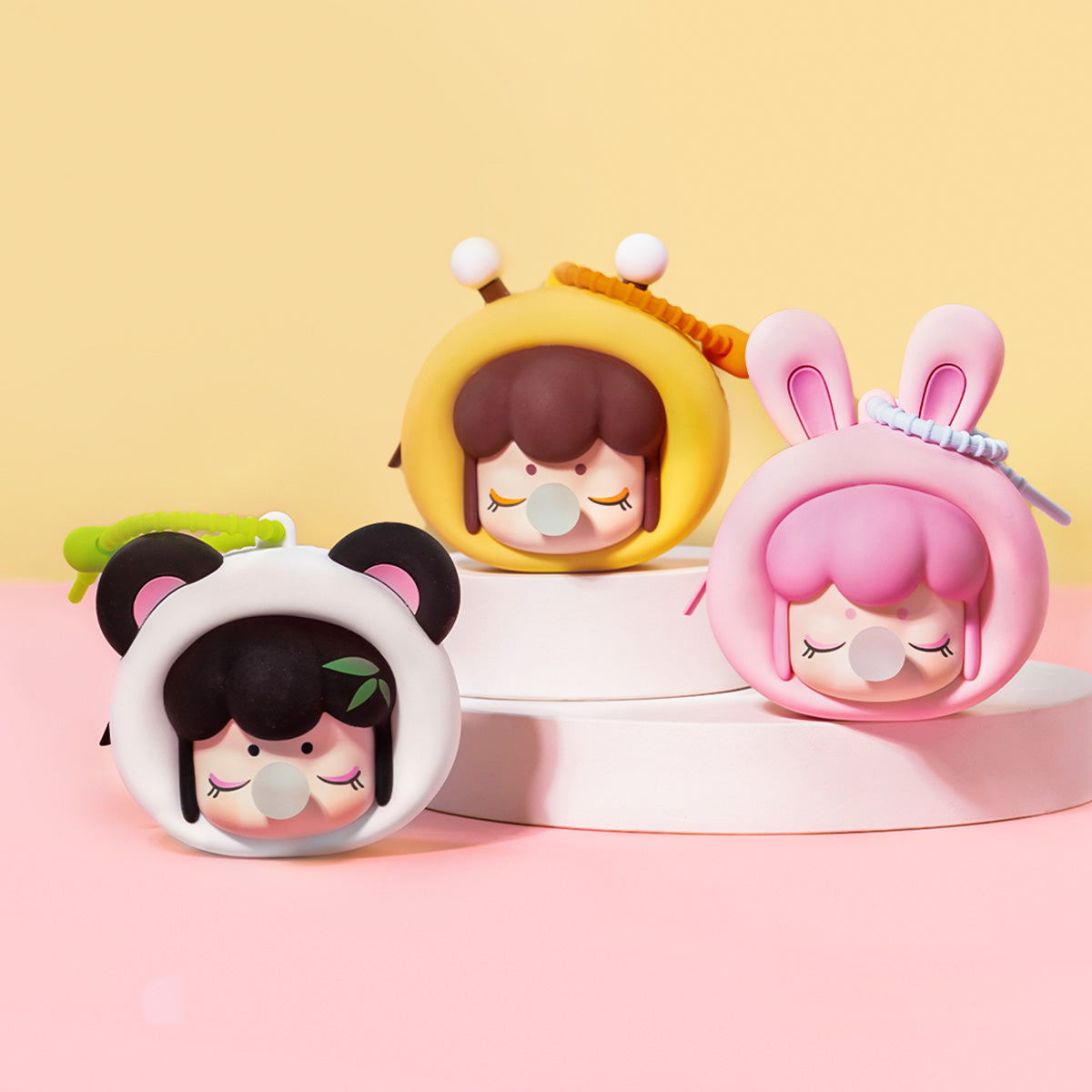 Baby Nanci Fluffy Party earphone case lineup display in a pastel scene