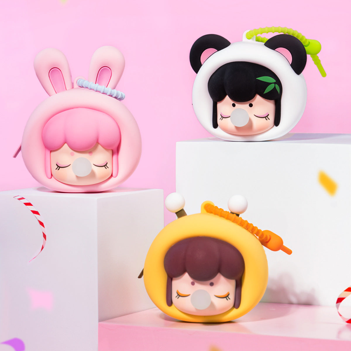 Baby Nanci Fluffy Party earphone case collection display on pastel blocks