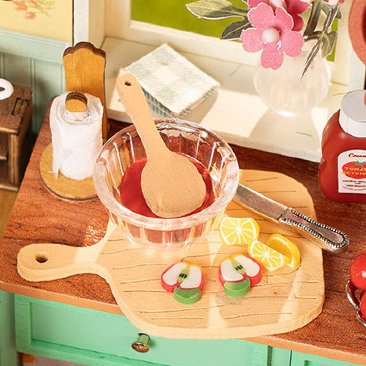 Close-up of the Sunlit Farmhouse Kitchen mixing bowl, cutting board, and window flowers