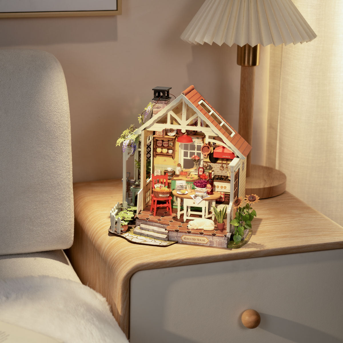 Rolife Sunlit Farmhouse Kitchen DH101 displayed on a bedside table with warm lighting