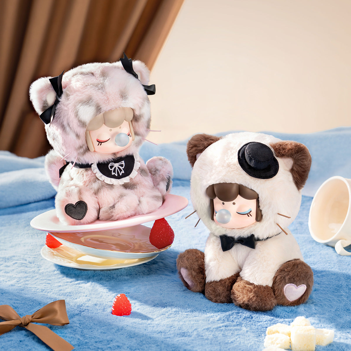 Nanci Tea Time Kitties Gentleman and Pink Maid plush dolls on a tabletop