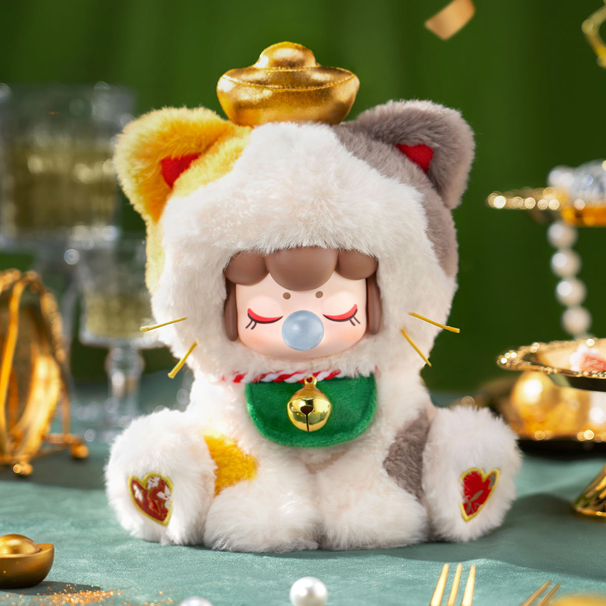 Nanci Tea Time Kitties Wealth God plush doll in a warm display scene