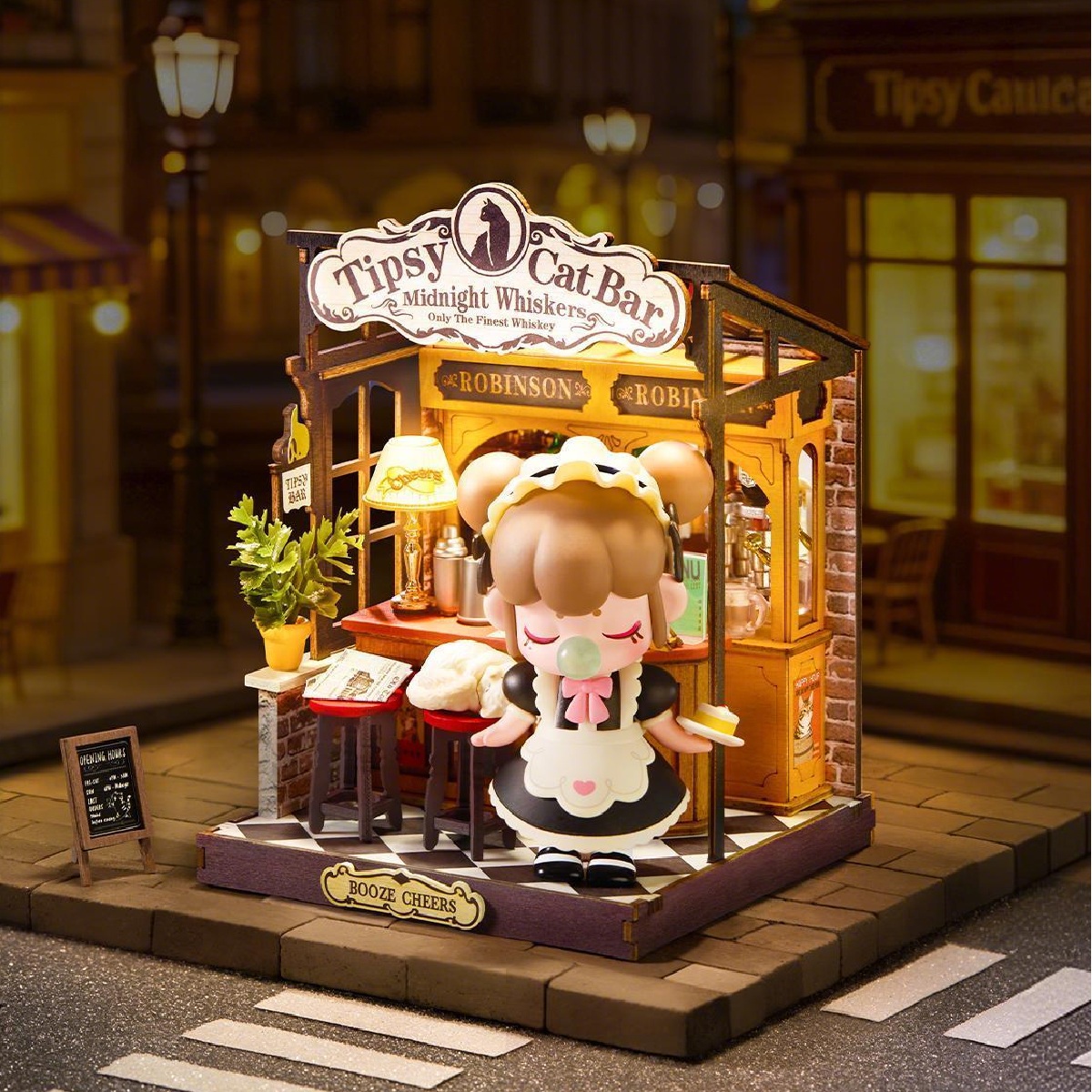 Tipsy Cat Bar miniature scene with cat figure, stools, and illuminated counter