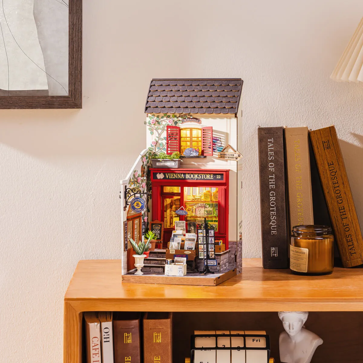 Vienna Bookstore DG183 shelf display scene with the lighted storefront