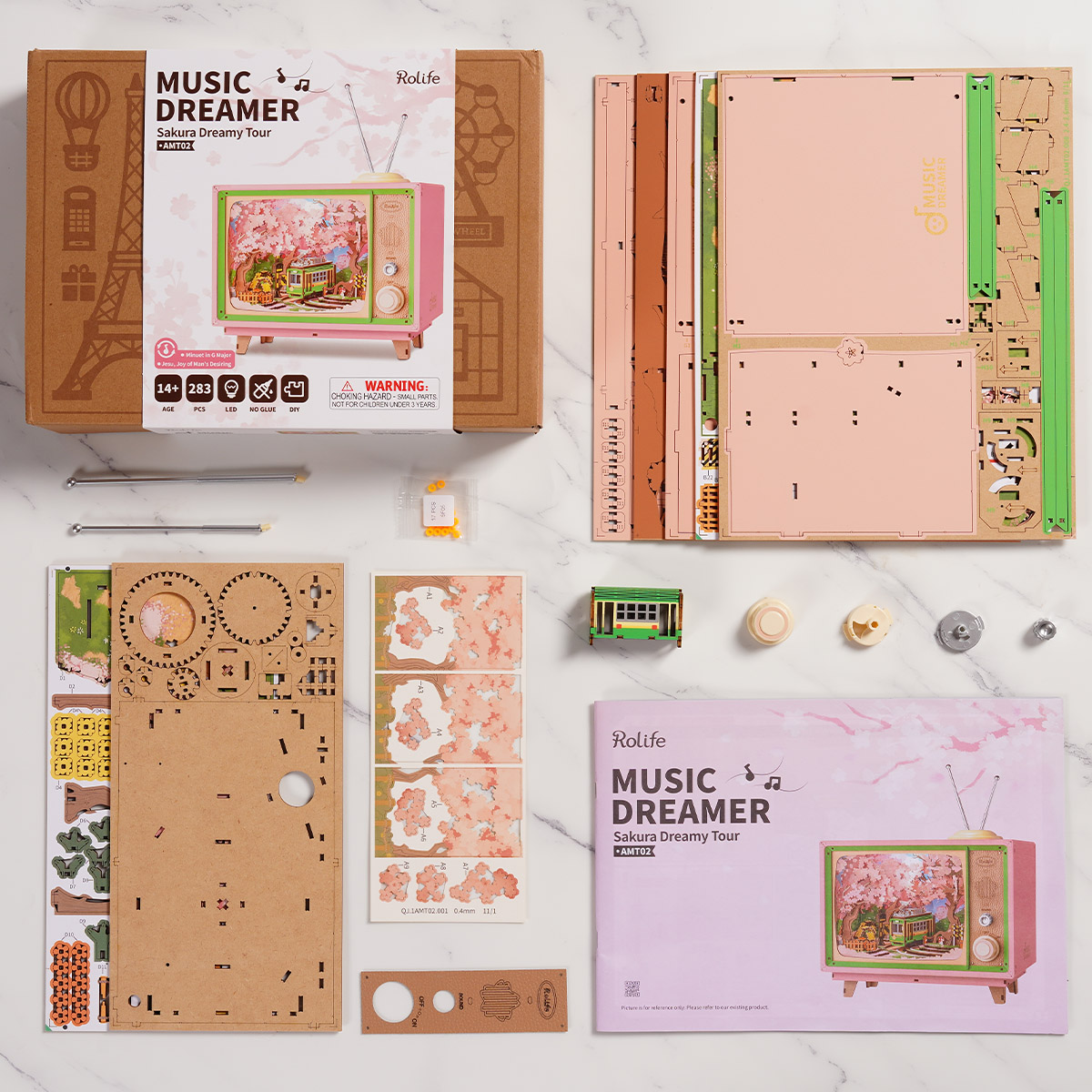Sakura Dreamy Tour AMT02 materials and parts layout for the music box kit