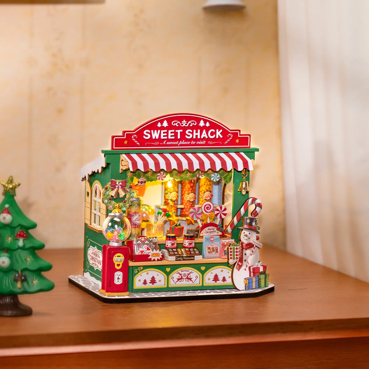 Christmas Candy Stand DS043 tabletop display scene beside a small Christmas tree