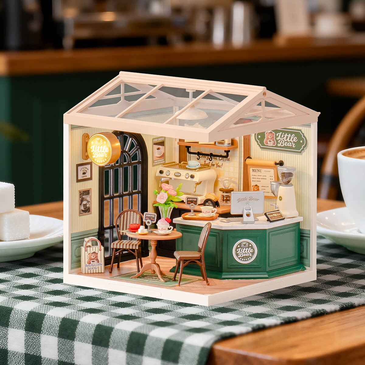 Perfect Romance Cafe DW028 miniature coffee shop displayed on a cafe table
