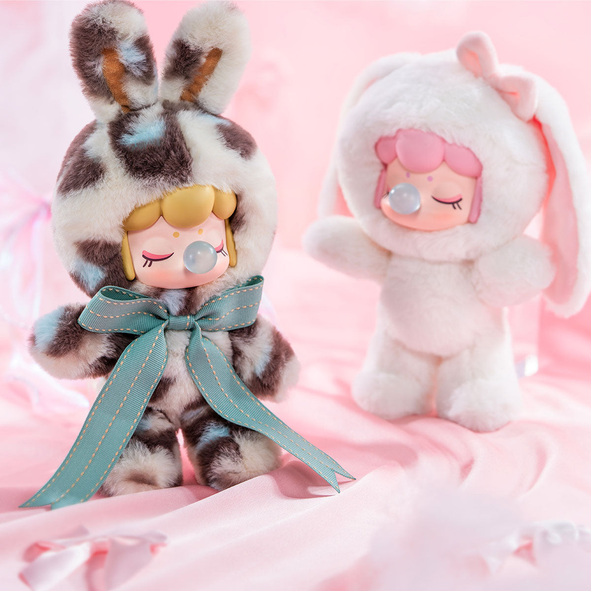Nanci's Shining Bunny MNBXX leopard and floppy-ear plush dolls with ribbon bows