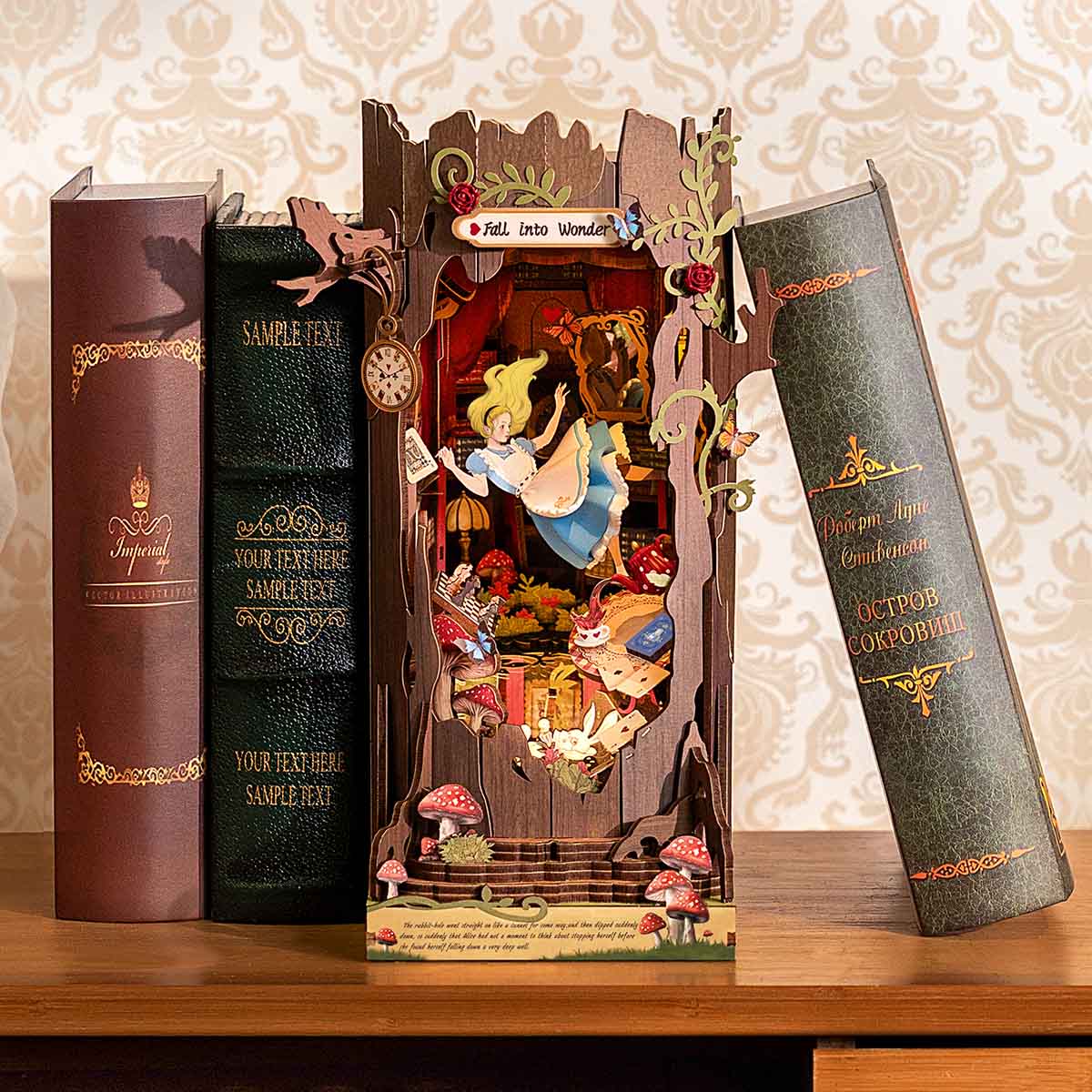 Fall into Wonder TGB12 tabletop display beside stacked books and wallpaper backdrop