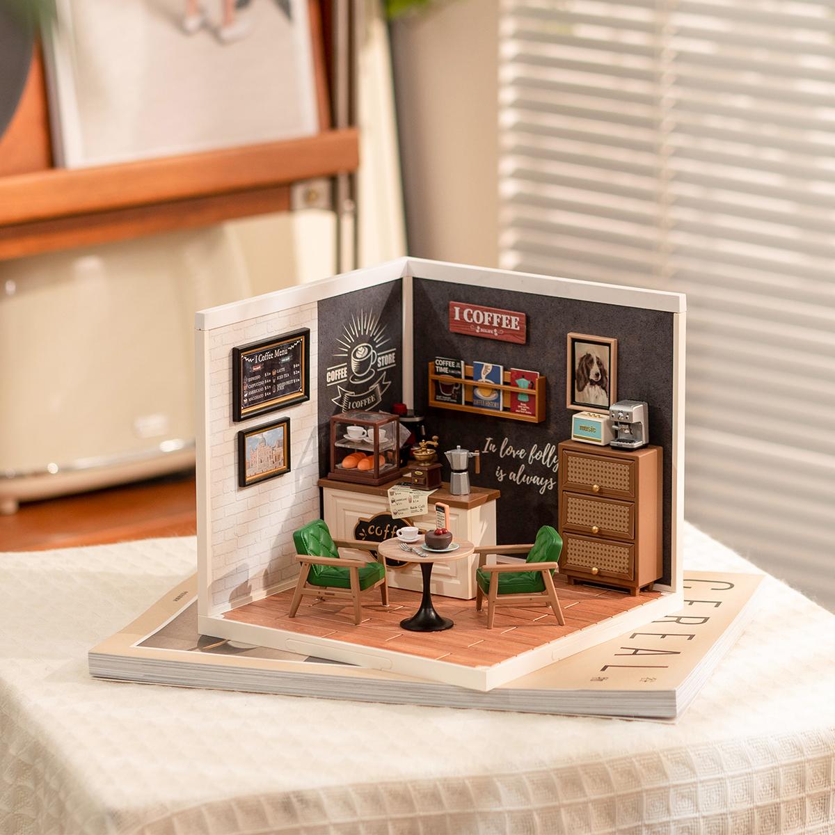Rolife Daily Inspiration Cafe Super Creator Miniature House DW001B tabletop display scene at a window