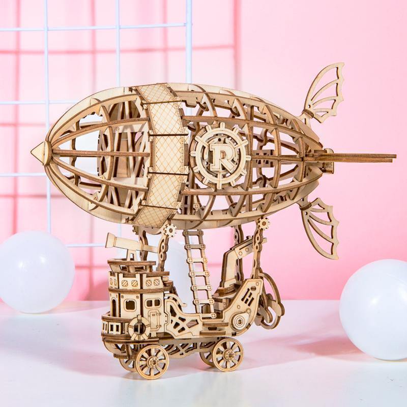 Rolife Airship TG407 wooden puzzle in a pink tabletop display scene